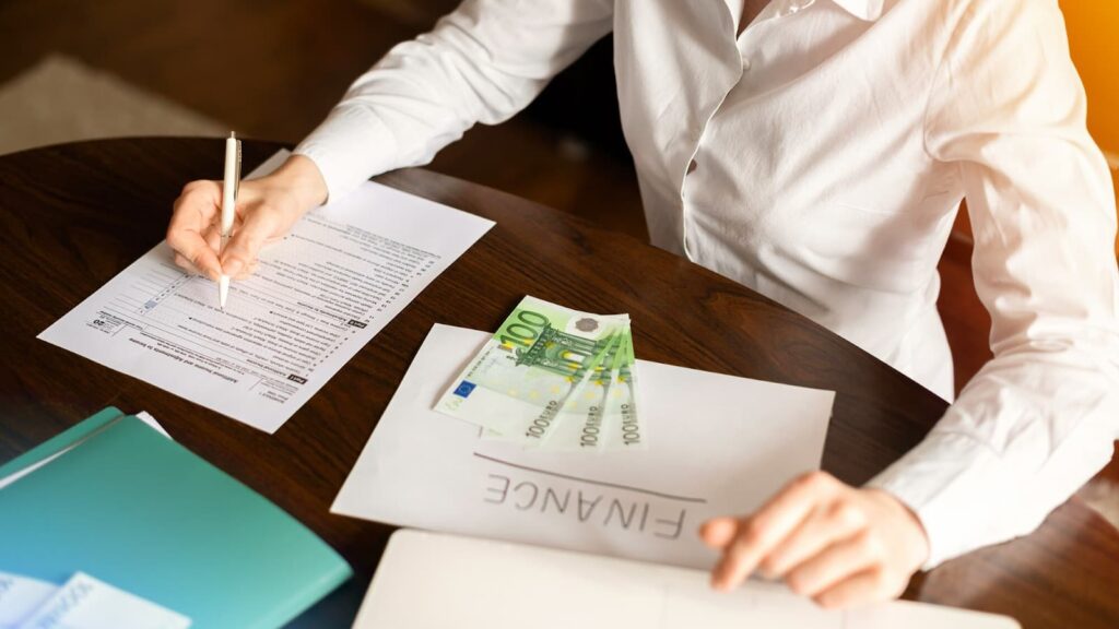 Man signing a document